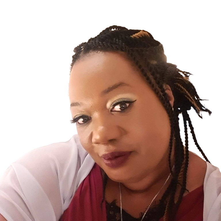 Pearline Nelson-Stephens, a woman, with braided hair smiles, wearing makeup and a burgundy top against a white background.